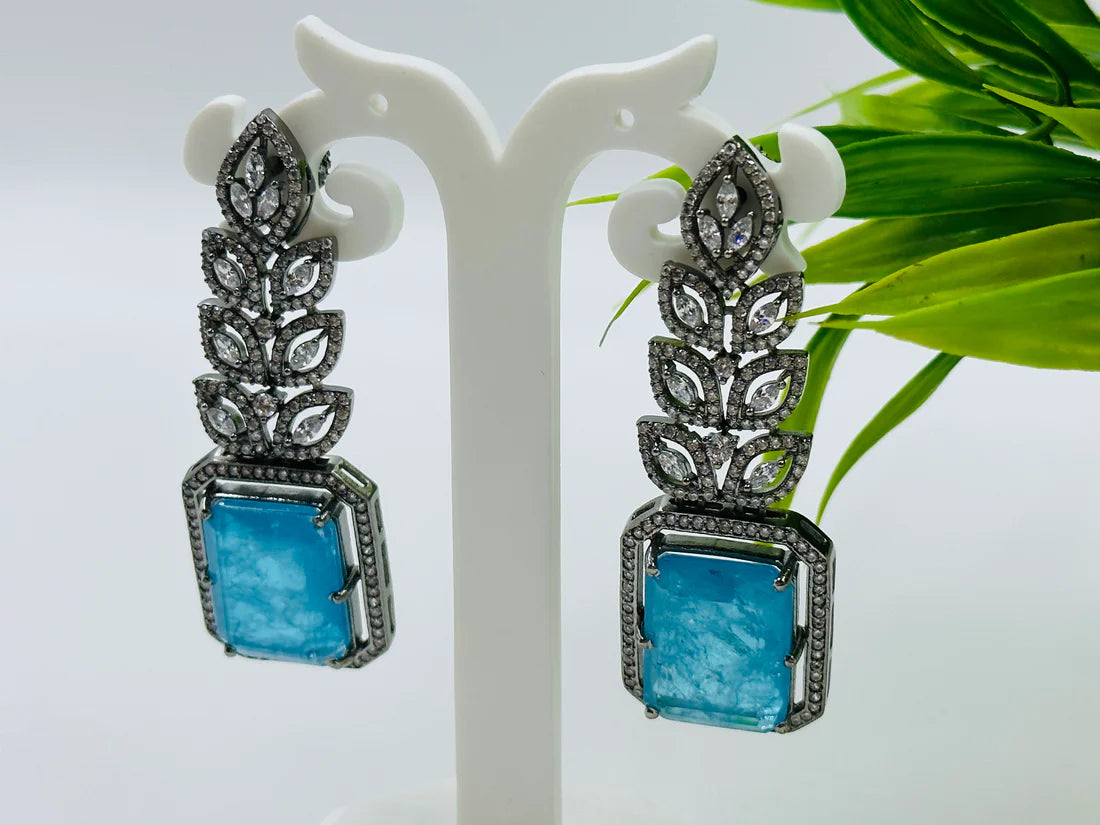 ELEGANT BLUE GLASS STONE ANS AD STUDDED EARRINGS
