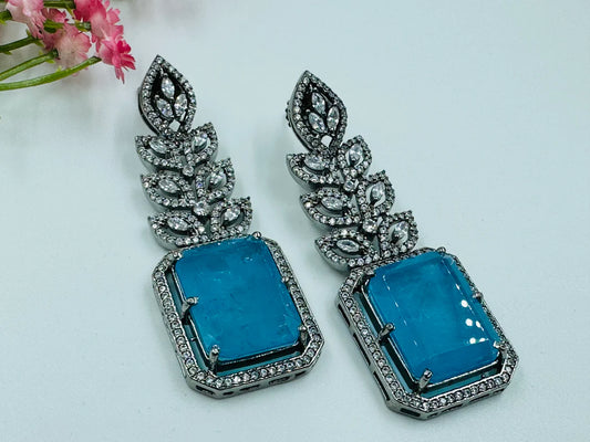 ELEGANT BLUE GLASS STONE ANS AD STUDDED EARRINGS