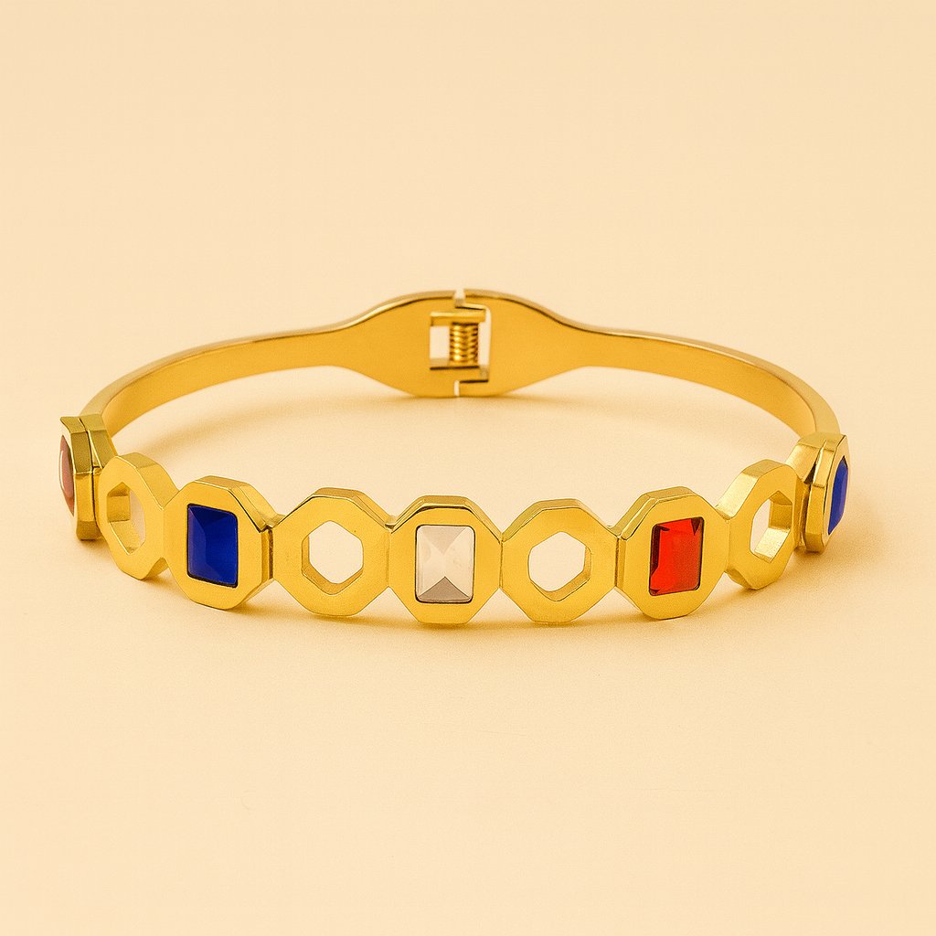 Geometric Gold-Plated Bracelet with Red, Blue & White Stones – Modern Statement Jewelry