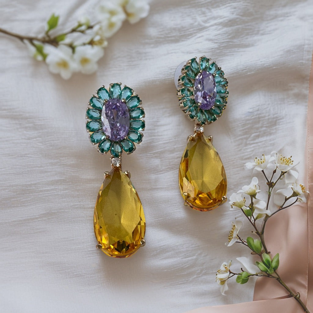 AESTHETIC GLASS STONE AND AD STUDDED EARRING