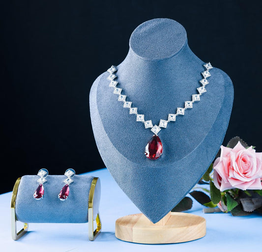 NESACCESSORIES AD ZIRCONIA AND RED GLASS STONE STUDDED NECKLACE SET